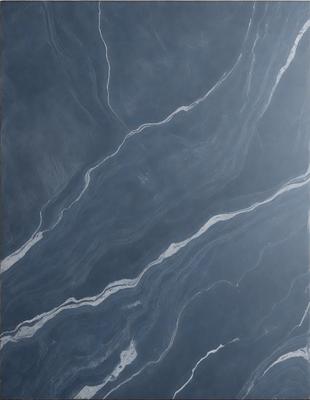 The primary subject of the image is a blue marble tile with a wavy pattern. The setting is a bathroom, and the visual style is a photo. The dominant colors are blue and gray, creating a calm and soothing atmosphere.