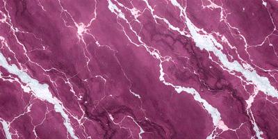The primary subject of the image is a marbled surface, which appears to be a purple marble. The setting is a close-up of the marbled surface, showcasing its intricate patterns and textures. The visual style is a realistic representation of the marbled surface, capturing its natural beauty. The dominant colors in the image are purple and red, creating a rich and luxurious atmosphere.