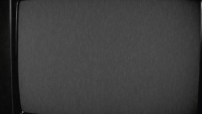 The primary subject of the image is a gray background. The setting is a plain, empty space with no visible objects or people. The visual style is a close-up of the gray background, which gives the image a simple and minimalistic appearance. The colors and mood are predominantly gray, creating a calm and uncluttered atmosphere.