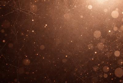 The primary subject of the image is a close-up of a brown surface, possibly a wall or a piece of fabric, with a pattern of small circles or dots. The setting appears to be a dark room, and the visual style is a close-up of the surface. The colors and mood of the image are predominantly dark and moody, with the small circles or dots providing a contrasting element.