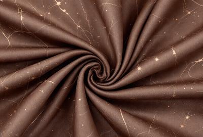 The primary subject of the image is a brown fabric, possibly a piece of cloth or a curtain. The setting is a close-up of the fabric, showcasing its texture and pattern. The visual style is a detailed, up-close view of the fabric, which gives it a textured and intricate appearance. The colors and mood of the image are predominantly brown, creating a warm and earthy atmosphere.