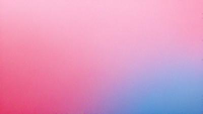 The primary subject of the image is a pink background. The setting is a wall, and the visual style is a photo. The colors and mood of the image are predominantly pink, creating a warm and inviting atmosphere.