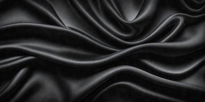 The primary subject of the image is a black fabric, which appears to be a piece of silk. The setting is a black background, and the visual style is a close-up of the fabric. The colors and mood of the image are predominantly dark and moody, with the black fabric being the main focus.