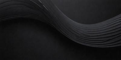 The primary subject of the image is a black and white photo of a curved, wavy, or flowing pattern. The setting is a dark background, which emphasizes the contrast between the pattern and the background. The visual style is a black and white photo, giving it a classic and timeless appearance. The colors and mood of the image are predominantly dark and moody, with the black and white pattern creating a sense of depth and intrigue.