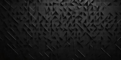 The primary subject of the image is a black wall with a pattern of triangles. The setting is a dark room, and the visual style appears to be a pattern or texture. The dominant colors are black and white, creating a moody atmosphere.