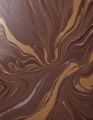 The primary subject of the image is a close-up of a wooden table with a brown and gold marbled pattern. The setting is a room with a wooden floor, and the visual style appears to be a photo of the table. The colors and mood of the image are warm and inviting, with the brown and gold marbled pattern creating a sense of luxury and sophistication.