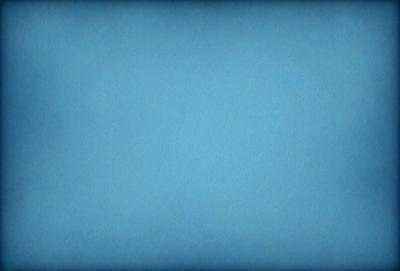 The primary subject of the image is a large, empty blue sky. The setting is a vast, open space with no visible landmarks or objects. The visual style is a natural, outdoor scene with a focus on the sky. The colors and mood are predominantly blue, creating a calm and serene atmosphere.