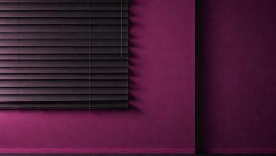 The primary subject of the image is a black shade on a window. The setting is a pink wall, which creates a contrasting backdrop for the shade. The visual style is a photo, capturing the black shade and the pink wall. The colors and mood of the image are predominantly pink, giving it a warm and inviting atmosphere.