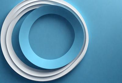 The primary subject of the image is a blue circle, which is the main object, scene, or focus of the image. The setting is a blue background, and the visual style is a photo. The dominant colors are blue and white, creating a calm and serene atmosphere.