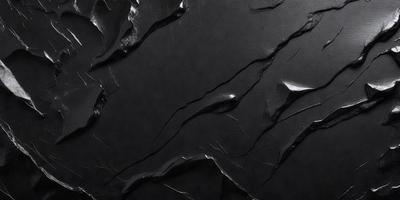 The primary subject of the image is a black surface with a pattern of white streaks. The setting appears to be a dark room, and the visual style is a close-up of the black and white pattern. The colors and mood of the image are predominantly dark and moody, with the white streaks adding a touch of contrast.