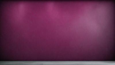 The primary subject of the image is a purple wall. The setting is a room with a purple wall, and the visual style is a photo. The dominant colors are purple and pink, creating a calm and soothing atmosphere.