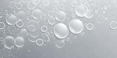 The primary subject of the image is a large number of bubbles floating in a white, bubbly substance. The setting appears to be a white background, which creates a clean and minimalistic visual style. The colors and mood of the image are predominantly white, giving it a calm and serene atmosphere.