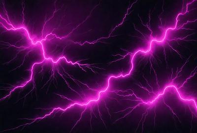 The primary subject of the image is a purple lightning bolt, which is the main object, scene, or focus of the image. The setting or background is a dark sky, and the visual style appears to be a photo. The dominant colors in the image are purple and pink, creating a vibrant and energetic atmosphere.