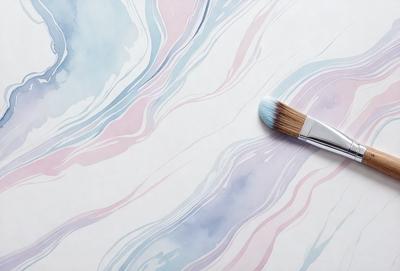 The primary subject of the image is a brush, which is placed on a table. The setting is a table with a blue and white striped background. The visual style is a photo, and the colors and mood are predominantly blue and white, creating a calm and serene atmosphere.