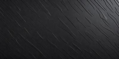The primary subject of the image is a black background with a pattern of white lines. The setting appears to be a dark room, and the visual style is a close-up of the black background with the white lines. The colors and mood of the image are predominantly dark and moody, with the white lines adding a touch of contrast and interest to the overall composition.