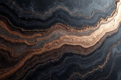 The primary subject of the image is a close-up of a marble countertop. The setting is a kitchen, with the countertop being the main focus of the scene. The visual style is a photo, capturing the intricate details of the marble surface. The colors and mood of the image are predominantly dark, with the marble countertop being the main source of light and contrast.