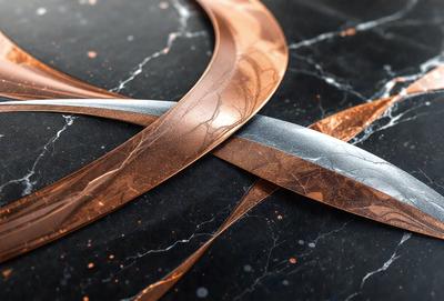 The primary subject of the image is a pair of scissors, which are prominently displayed on a black marble surface. The scissors are made of metal and have a copper-colored handle. The setting is a black marble countertop, which provides a contrasting background for the scissors. The visual style of the image is a close-up of the scissors, emphasizing their details and texture. The colors and mood of the image are dark and moody, with the black marble
