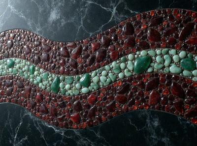 The primary subject of the image is a decorative piece featuring a red and green striped design. The setting is a black background, which contrasts with the vibrant colors of the striped design. The visual style appears to be a combination of digital art and illustration, creating a unique and eye-catching pattern. The colors and mood of the image are energetic and lively, with the red and green colors evoking a sense of warmth and vitality.