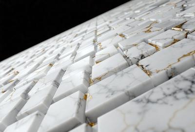 The primary subject of the image is a large, intricate marble wall with a gold and white color scheme. The setting is a room with a black background, which contrasts with the white marble and gold accents. The visual style is a combination of photo and digital art, creating a unique and eye-catching pattern. The colors and mood of the image are elegant and sophisticated, with the gold and white elements adding a touch of luxury and refinement.