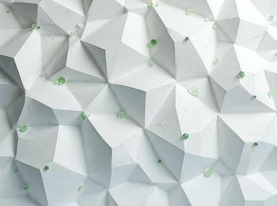 The primary subject of the image is a white wall with a pattern of green and clear beads or crystals. The setting is a white room, and the visual style appears to be a combination of digital art and illustration. The dominant colors are white and green, creating a clean and fresh atmosphere.