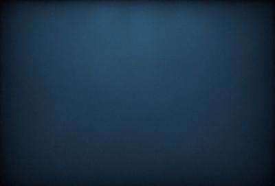 The primary subject of the image is a blue background. The setting is a dark, empty space with no visible objects or people. The visual style is a simple, monochromatic design. The colors and mood are predominantly dark and moody, with the blue background creating a sense of depth and mystery.