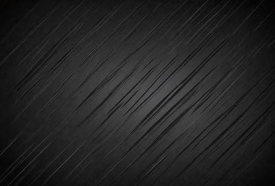 The primary subject of the image is a black and white photo of a patterned surface. The setting is a dark background, and the visual style is a close-up of the pattern. The dominant colors are black and white, creating a moody atmosphere.