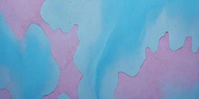The primary subject of the image is a blue and pink ocean scene. The setting is a blue and white ocean with a pink and white surface. The visual style is a combination of digital art and illustration, creating a unique and artistic representation of the ocean. The dominant colors are blue, pink, and white, giving the scene a calming and serene atmosphere.