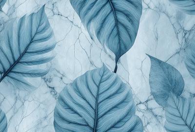 The primary subject of the image is a large blue leaf, which is the main focus of the scene. The leaf is placed on a white marble surface, creating a striking contrast between the blue leaf and the white background. The visual style of the image is a combination of a photo and digital art, as it appears to be a close-up of the leaf, yet it has a digital art-like quality to it. The dominant colors in the image are blue and white, giving it a calm and serene atmosphere.