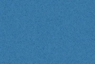 The primary subject of the image is a blue surface, which appears to be a blue carpet or a blue wall. The setting is a room with a blue background, and the visual style is a close-up of the blue surface. The colors and mood of the image are predominantly blue, creating a calm and serene atmosphere.