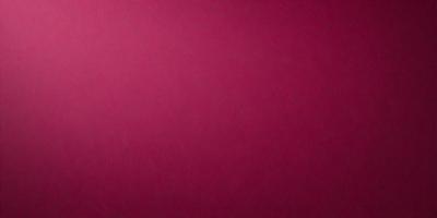 The primary subject of the image is a large, pink wall. The setting is a room with a pink background, and the visual style is a close-up of the wall. The dominant colors in the image are pink, and the overall atmosphere is warm and inviting.