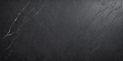 The primary subject of the image is a black marble countertop. The setting is a dark room, and the visual style is a close-up of the marble countertop. The colors and mood of the image are dark and moody, with the black marble countertop being the main focus.