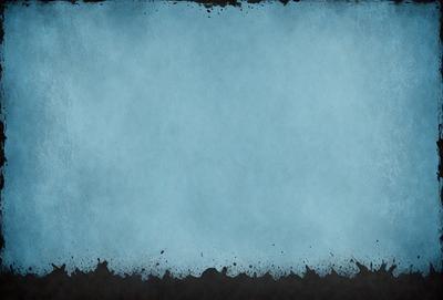 The primary subject of the image is a large, blue, textured surface. The setting is a blue sky, and the visual style is a combination of a photo and digital art. The colors and mood of the image are predominantly blue, creating a calm and serene atmosphere.