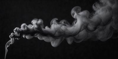 The primary subject of the image is a large, swirling cloud of smoke. The setting is a dark background, which contrasts with the smoke, making it the focal point of the image. The visual style is a close-up of the smoke, emphasizing its texture and movement. The colors and mood of the image are predominantly dark, with the smoke being the only light source, creating a dramatic and moody atmosphere.