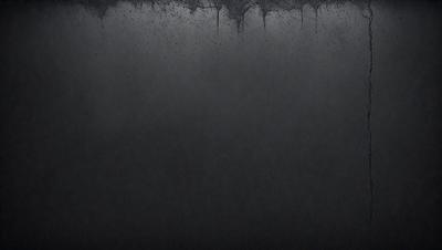 The primary subject of the image is a black background with a few white specks. The setting is a dark room, and the visual style is a black and white photo. The colors and mood of the image are dark and moody, creating a dramatic atmosphere.