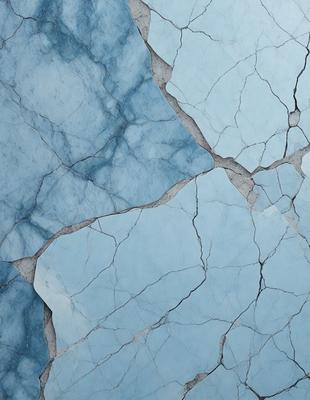 The primary subject of the image is a blue and white wall with a cracked and chipped appearance. The setting is a room with a blue and white color scheme. The visual style is a close-up of the wall, showcasing the cracks and chips. The colors and mood of the image are predominantly blue and white, giving it a calm and serene atmosphere.