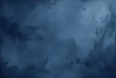 The primary subject of the image is a cloudy blue sky. The setting is a cloudy day, and the visual style is a photo. The sky is filled with clouds, and the dominant colors are blue and gray. The overall atmosphere is calm and serene.