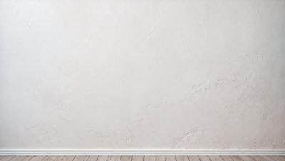 The primary subject of the image is a white wall with a marble texture. The setting is a room with a wooden floor. The visual style is a photo of a white wall with a marble texture. The colors and mood of the image are predominantly white, giving it a clean and minimalist appearance.