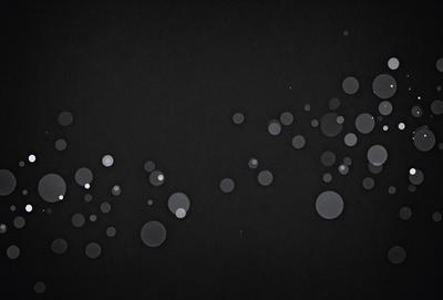 The primary subject of the image is a pattern of white dots on a black background. The setting is a dark, empty space, and the visual style appears to be a digital art or illustration. The dominant colors are black and white, creating a stark and minimalist atmosphere.