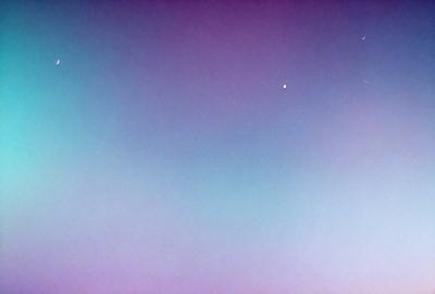 The primary subject of the image is a large, colorful sky. The sky is filled with a variety of colors, creating a vibrant and lively atmosphere. The setting is a vast, open space with no visible landmarks or objects, giving the viewer a sense of freedom and openness. The visual style of the image is a combination of natural elements and artistic expression, making it a unique and captivating piece of art.