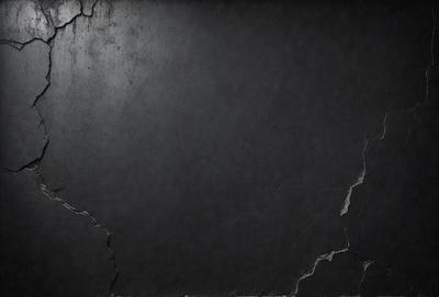 The primary subject of the image is a black wall with a cracked texture. The setting is a dark room, and the visual style is a close-up of the wall. The colors and mood of the image are predominantly dark and moody, with the black wall and cracked texture creating a sense of unease or tension.