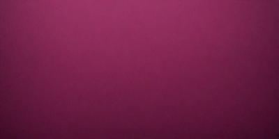 The primary subject of the image is a large, pink wall. The setting is a room with a pink background, and the visual style is a close-up of the wall. The dominant colors in the image are pink, and the overall atmosphere is warm and inviting.