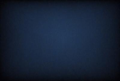 The primary subject of the image is a blue sky with no clouds. The setting is a dark blue background, which creates a contrasting effect with the sky. The visual style is a simple, clean, and minimalistic representation of the sky. The colors and mood of the image are predominantly dark and moody, with the blue sky providing a sense of calmness and tranquility.