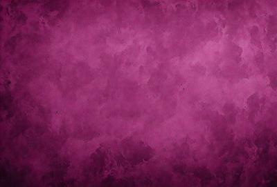 The primary subject of the image is a purple wall with a patterned texture. The setting is a room with a purple background. The visual style is a close-up of the purple wall, showcasing its unique texture. The colors and mood of the image are predominantly purple, creating a calm and soothing atmosphere.