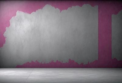 The primary subject of the image is a large, empty wall with a pink background. The setting is a room with a concrete floor. The visual style is a photo, and the colors and mood are predominantly pink, creating a warm and inviting atmosphere.