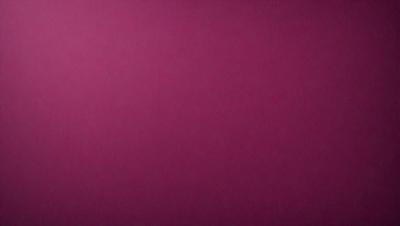 The primary subject of the image is a large, pink wall. The setting is a room with a pink background, and the visual style is a close-up of the wall. The dominant colors in the image are pink, and the overall atmosphere is warm and inviting.