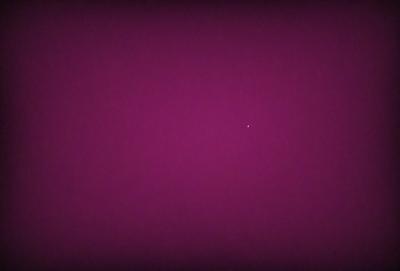 The image is a purple background with a single star visible in the middle of the frame. The star is the primary subject, and the purple background serves as the setting or background. The visual style appears to be a photo, and the colors and mood convey a sense of calmness and tranquility.