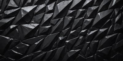The primary subject of the image is a black and white patterned wall. The setting is a dark room, and the visual style is a close-up of the patterned wall. The dominant colors are black and white, creating a moody atmosphere.
