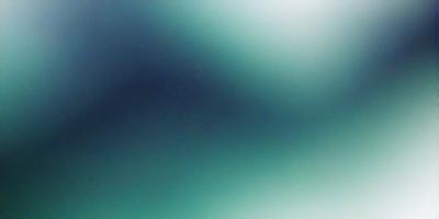 The primary subject of the image is a large, dark blue ocean. The setting is a vast expanse of water, with no visible land or other objects. The visual style is a photo of the ocean, capturing the vastness and depth of the water. The colors and mood are predominantly dark and moody, with the deep blue of the ocean creating a sense of calmness and tranquility.