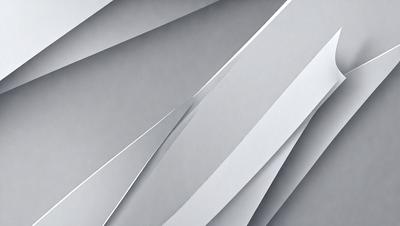 The primary subject of the image is a close-up of a white paper with a pattern of folded lines. The setting is a gray background, which contrasts with the white paper. The visual style is a close-up of the paper, showcasing the intricate pattern of folded lines. The colors and mood of the image are predominantly white and gray, giving it a clean and minimalist appearance.