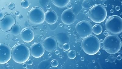 The primary subject of the image is a blue background with numerous small bubbles floating in the air. The setting appears to be a blue sky, and the visual style is a close-up of the bubbles. The colors and mood of the image are predominantly blue, creating a calm and serene atmosphere.